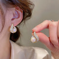 Flame Pearl Stud Earrings - Blingy Bag LLC