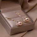 Champagne Pearl Dangle Earrings - Blingy Bag LLC